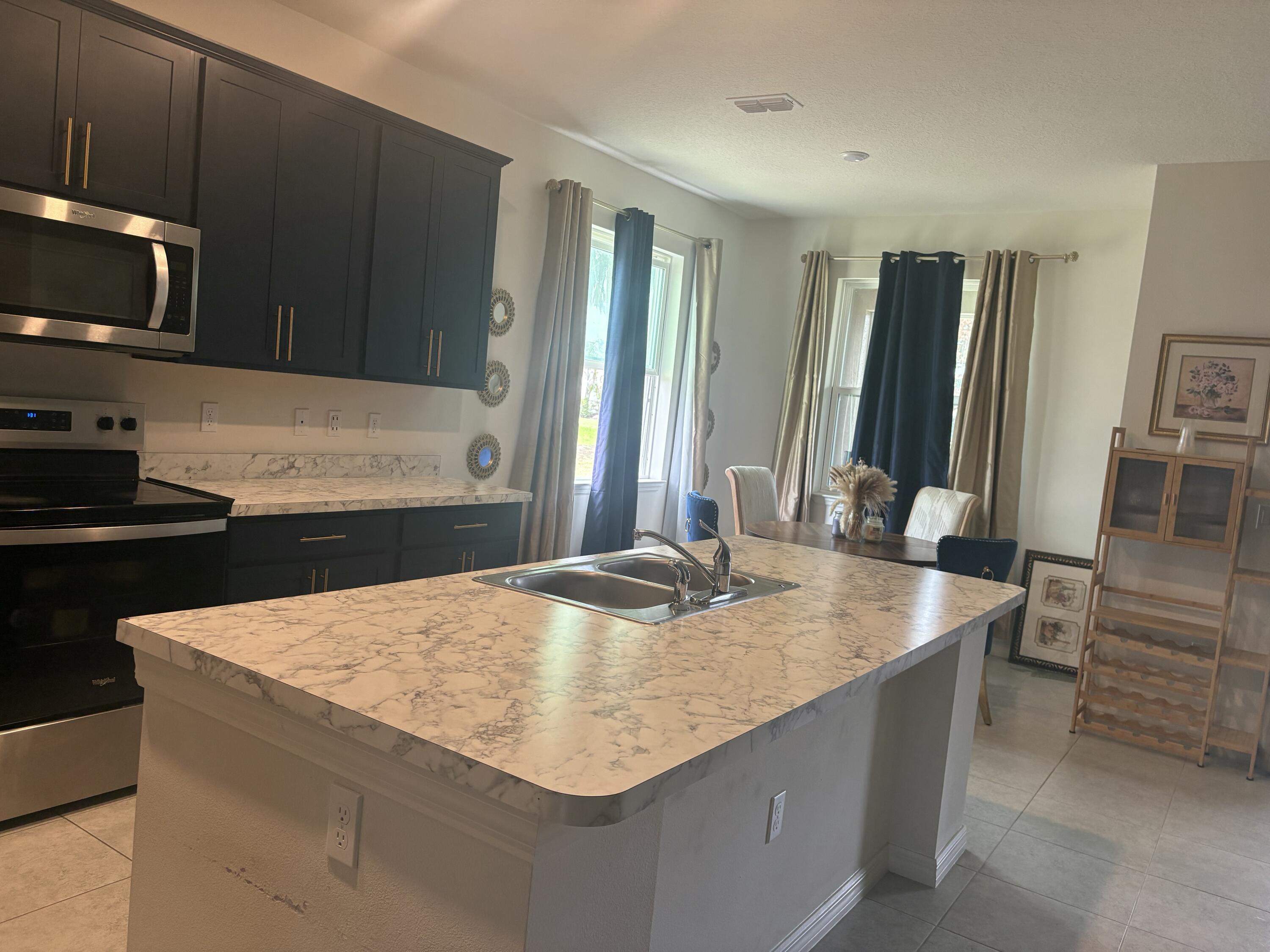 3982 Southwest Halcomb Street Port St. Lucie, FL 34953 - Photo 3 of 3 JOSEPH KITCHEN 1