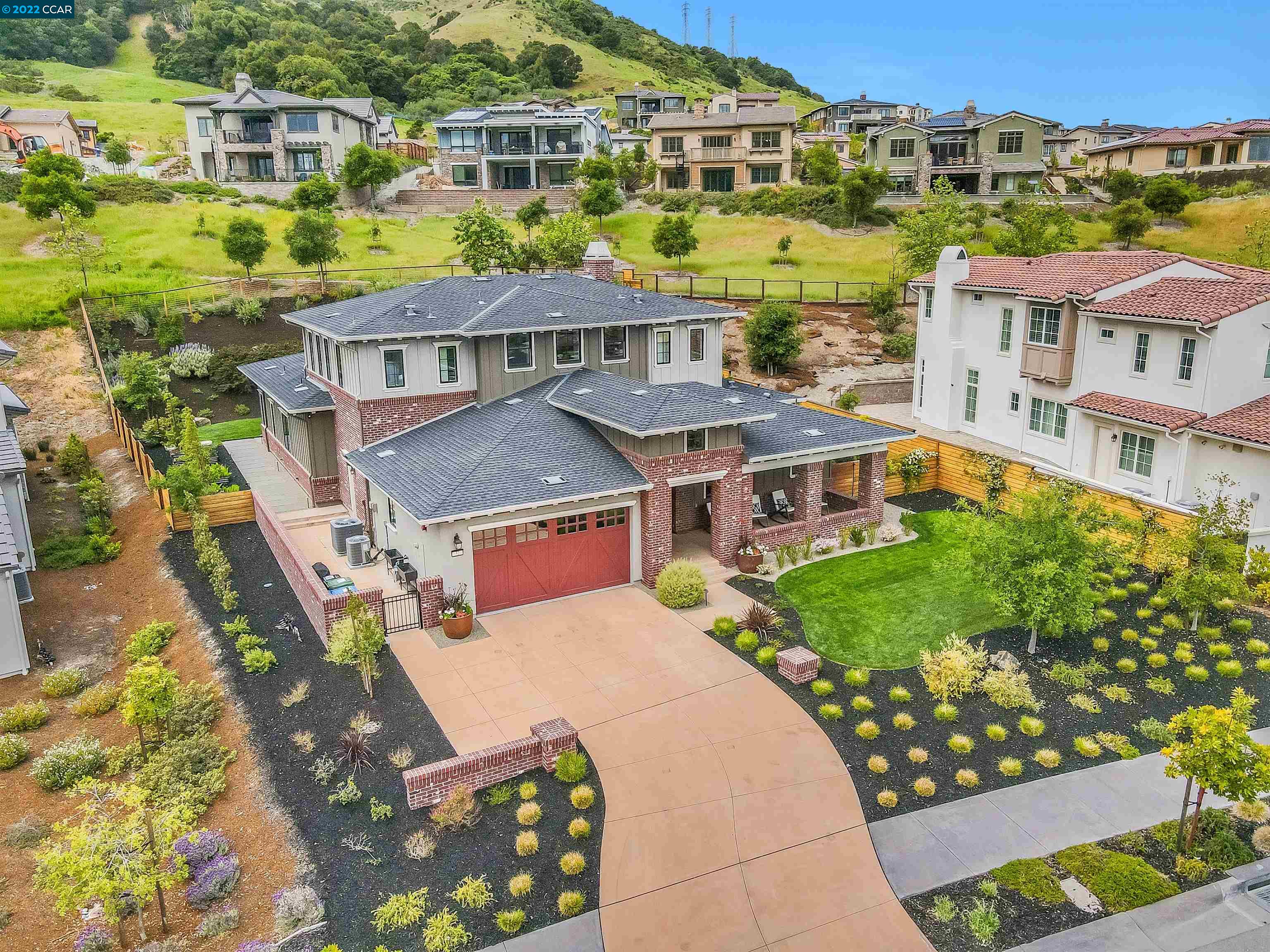 an aerial view of a house with a garden