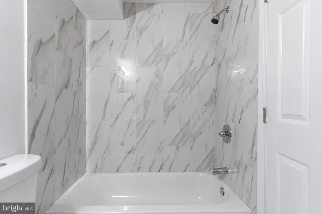 a bathroom with a bathtub