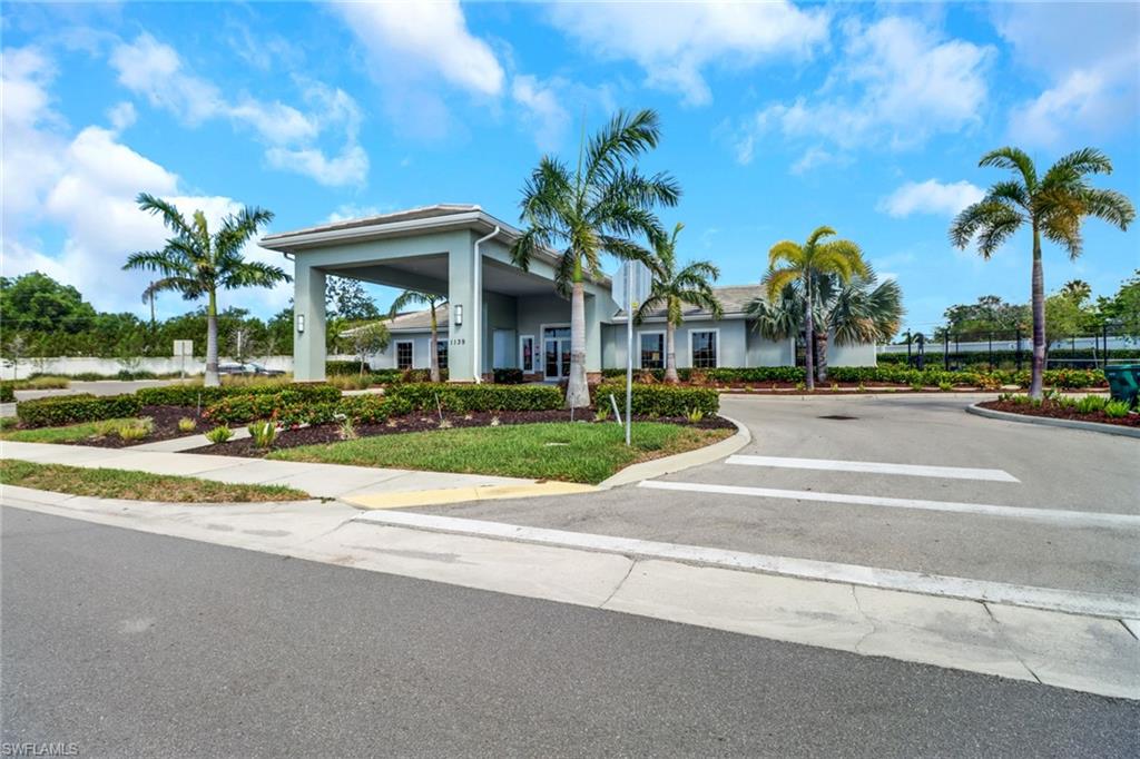 1256 Enbrook Loop Naples, FL 34114 - Photo 15 of 35 a view of street with palm trees