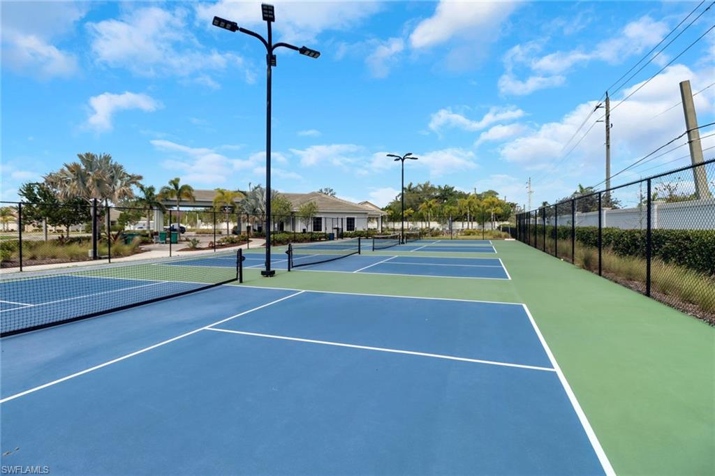 1256 Enbrook Loop Naples, FL 34114 - Photo 16 of 35 a view of a tennis court