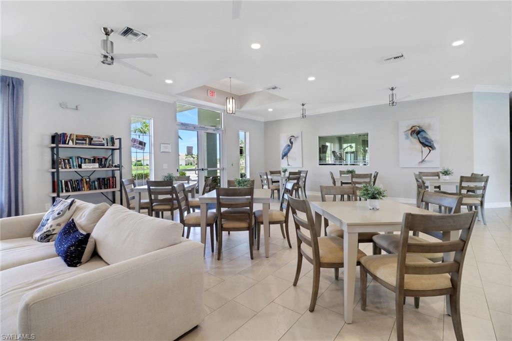 1256 Enbrook Loop Naples, FL 34114 - Photo 21 of 35 a living room with furniture a view of bedroom and a dining table