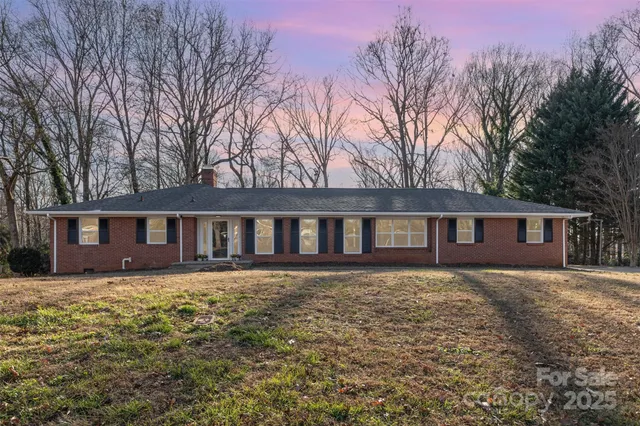 a front view of a house with yard