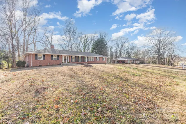an empty room with wooden floor
