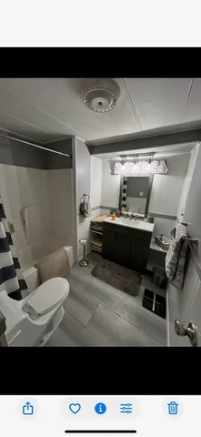 a kitchen view with table and chairs