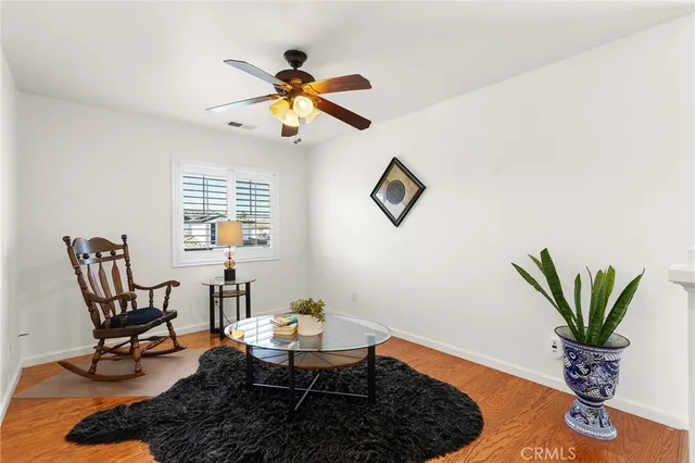 a spacious bathroom with a granite countertop sink mirror and cabinets