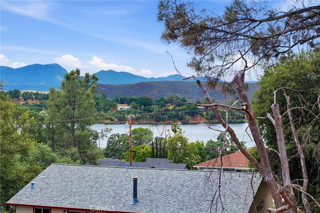 18685 Oak Grove Road Hidden Valley Lake, CA 95467 - Photo 48 of 52 a view of a street with a yard of the house