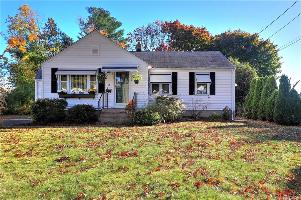 63 Ruby Road West Haven, CT 06516 - Photo 1 of 1 a front view of a house with a yard