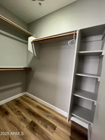 a view of a patio with a table and chairs