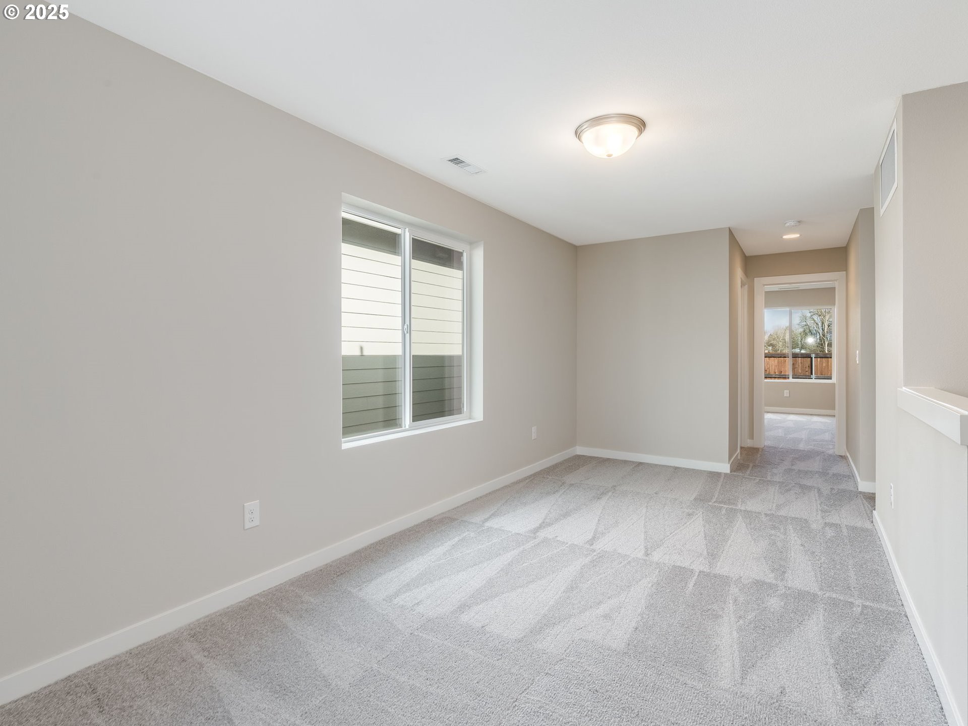 712 Northwest 178th Street Ridgefield, WA 98642 - Photo 18 of 41 an empty room with windows