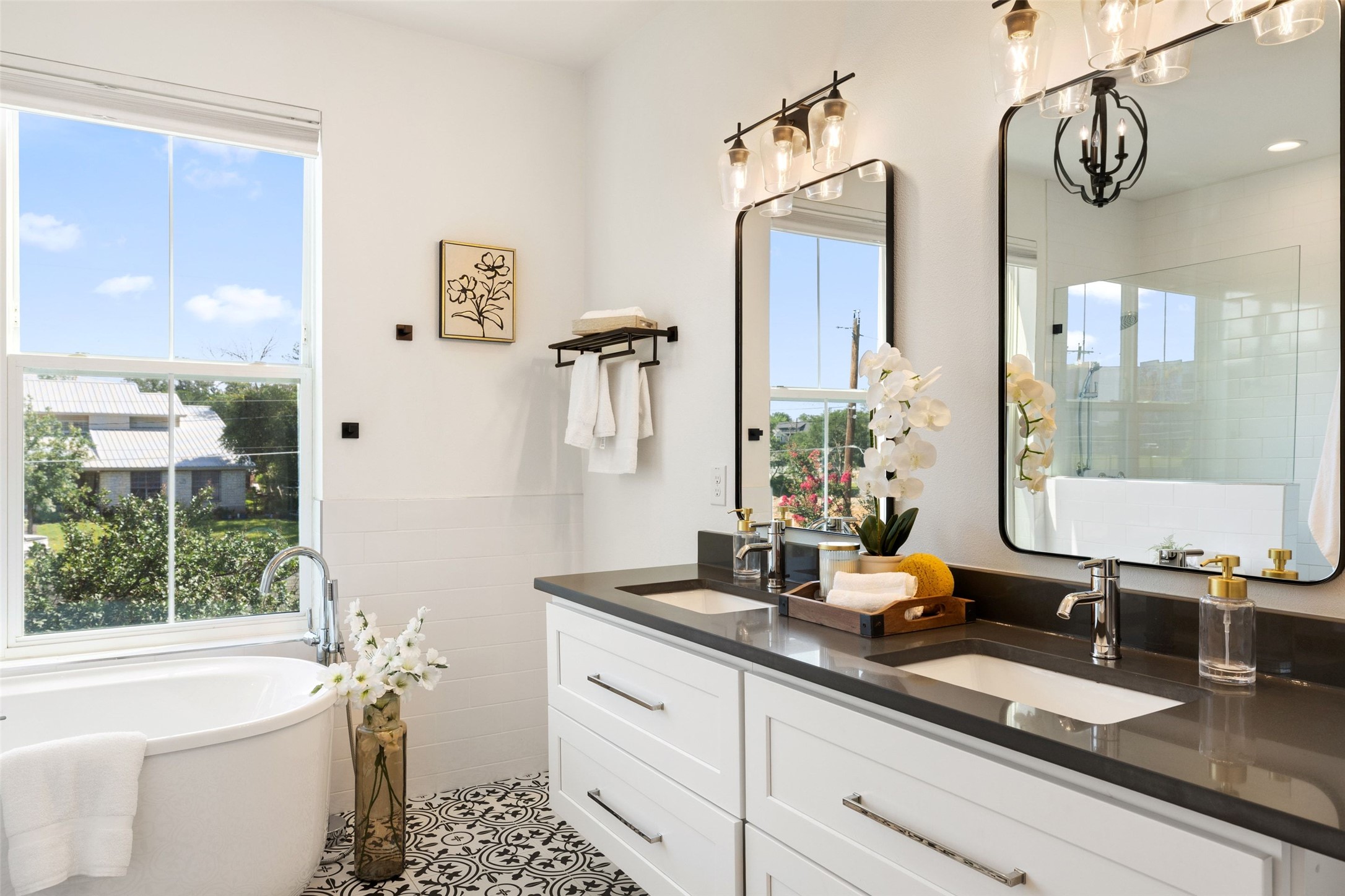 5601 Jackie Robinson Street, Unit 1 Austin, TX 78721 - Photo 22 of 40 Spa-inspired primary suite serves as a true retreat, featuring a luxurious bath and oversized walk-in closet.