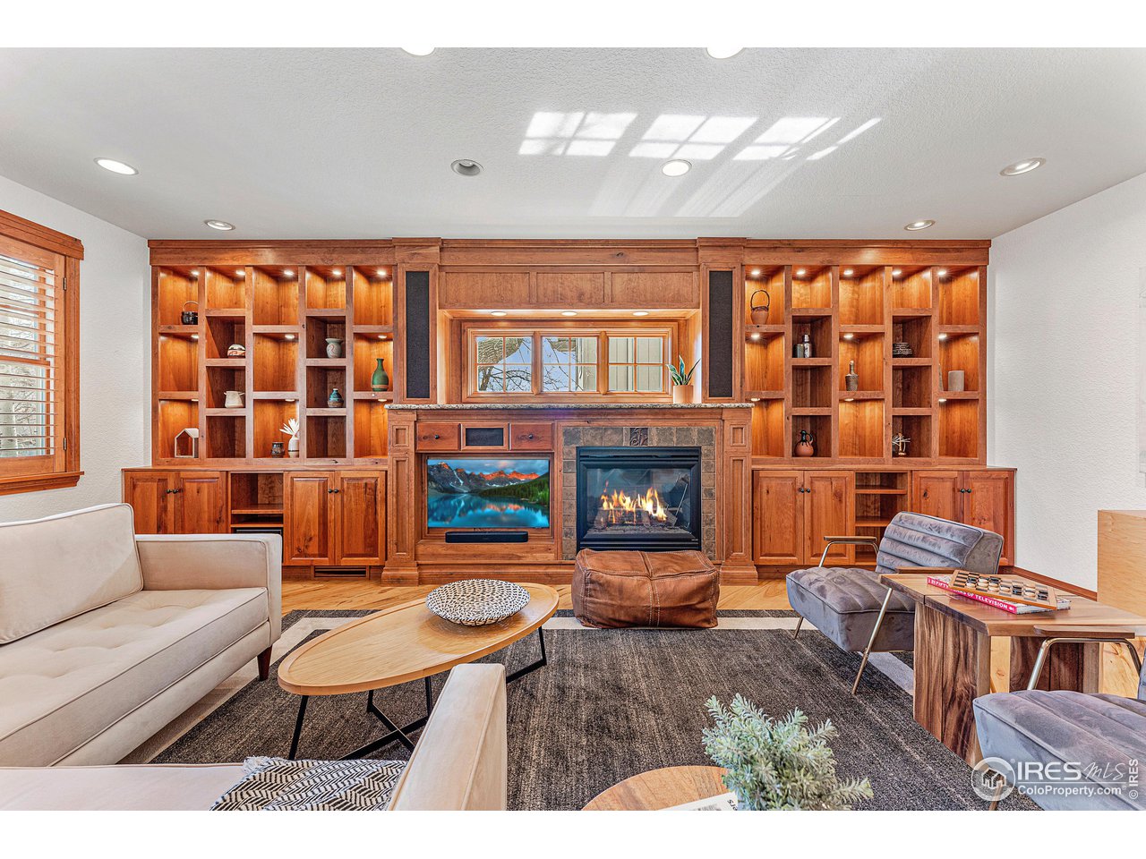 3024 8th Street Boulder, CO 80304 - Photo 12 of 37 family room with solid cherry built-ins