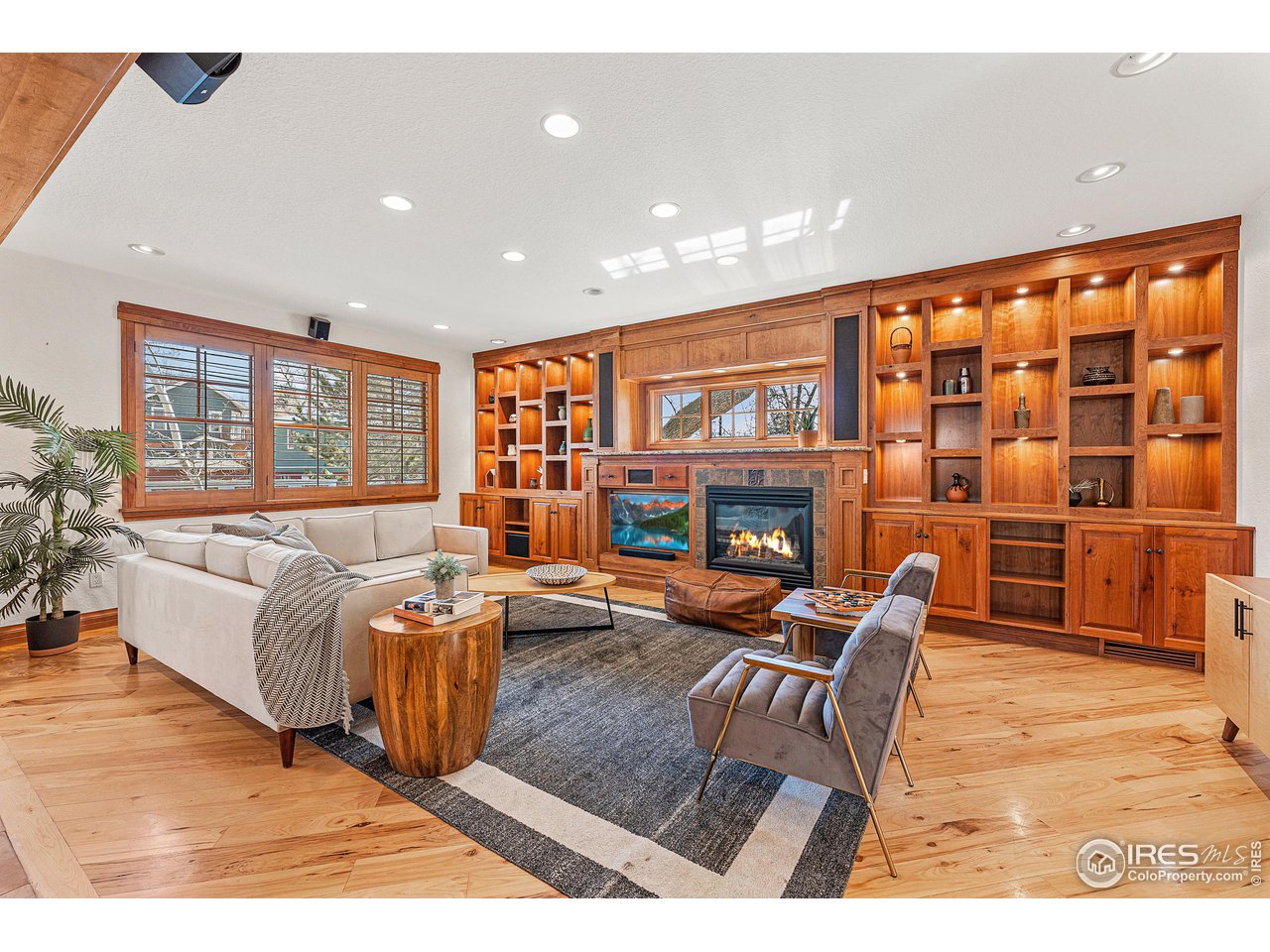3024 8th Street Boulder, CO 80304 - Photo 3 of 37 sun-filled family room open to kitchen with gas fireplace