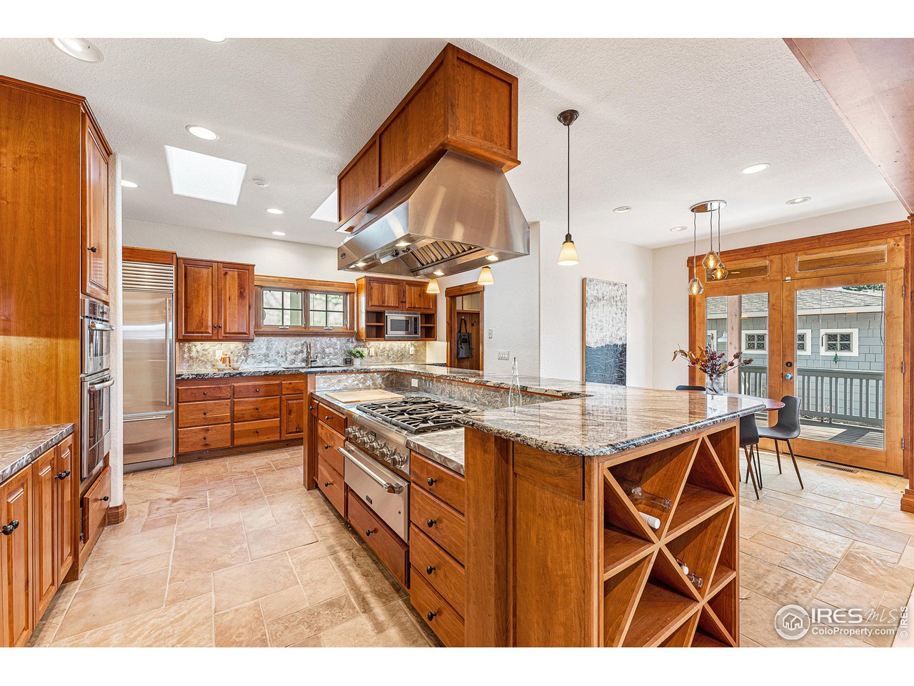 3024 8th Street Boulder, CO 80304 - Photo 4 of 37 SubZero, Bosch, and Thermador appliances - range with warming option, wine fridge, built-in espresso machine, double ovens