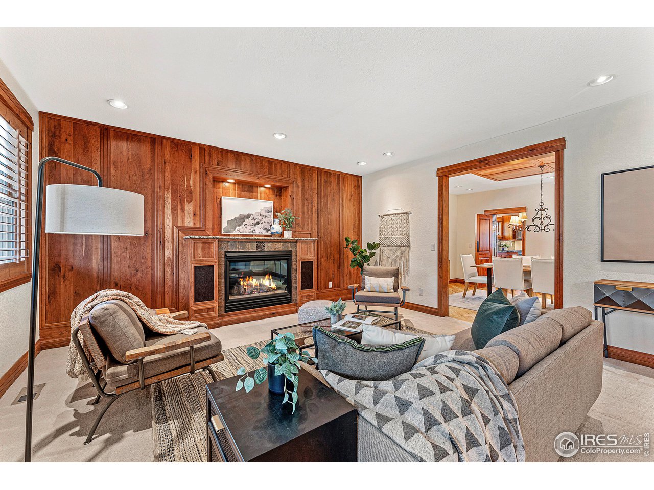 3024 8th Street Boulder, CO 80304 - Photo 5 of 37 living room with 2nd gas fireplace opens to dining room