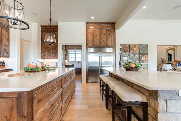 a view of a house with swimming pool and sitting area