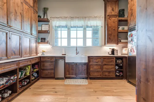 a view of swimming pool with a yard and seating space