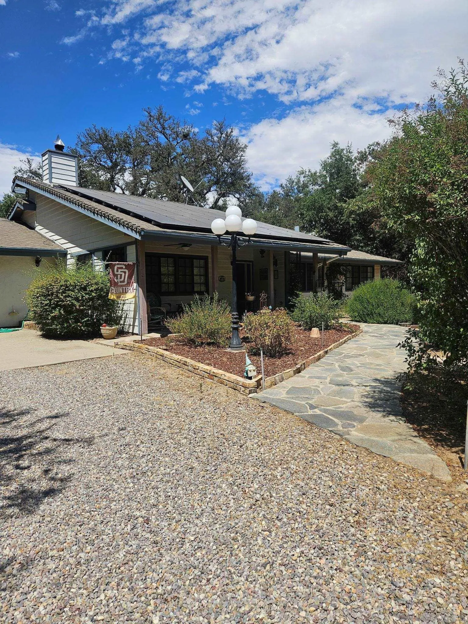 1449 Springview Road Santa Ysabel, CA 92070 - Photo 1 of 1 a view of a backyard with a patio