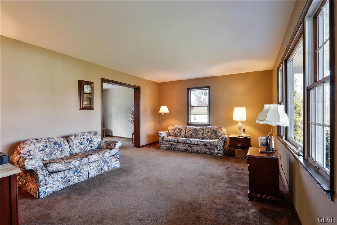 1406 Schoolhouse Road Perkasie, PA 18944 - Photo 4 of 33 a living room with furniture and a couch
