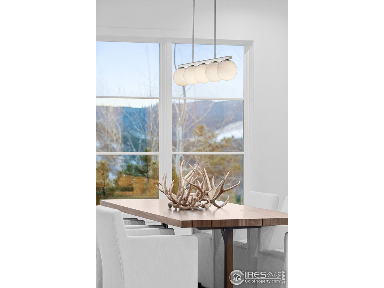 4872 Sugarloaf Road Boulder, CO 80302 - Photo 13 of 40 a view of a room with a floor to ceiling window