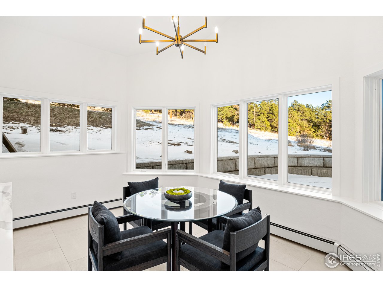 4872 Sugarloaf Road Boulder, CO 80302 - Photo 17 of 40 a living room with furniture and a window