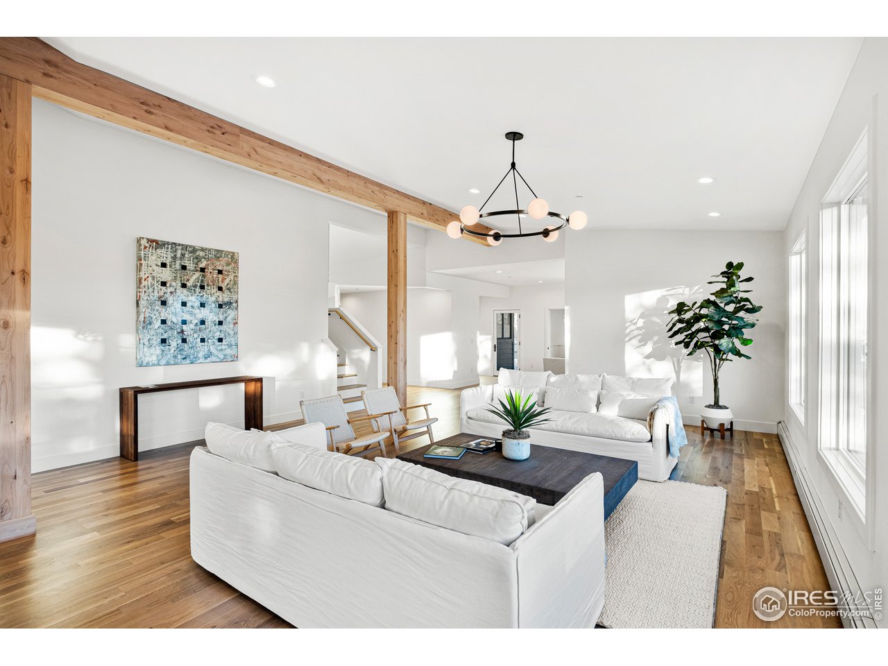 4872 Sugarloaf Road Boulder, CO 80302 - Photo 40 of 40 a living room with furniture and a chandelier