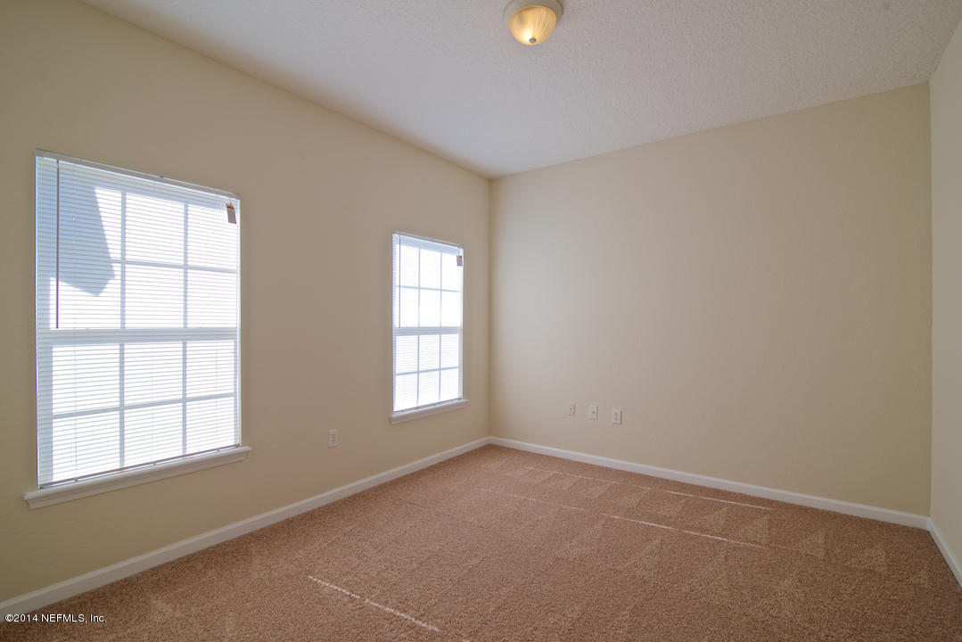 7170 Rampart Ridge Circle West Jacksonville, FL 32244 - Photo 11 of 22 an empty room with windows