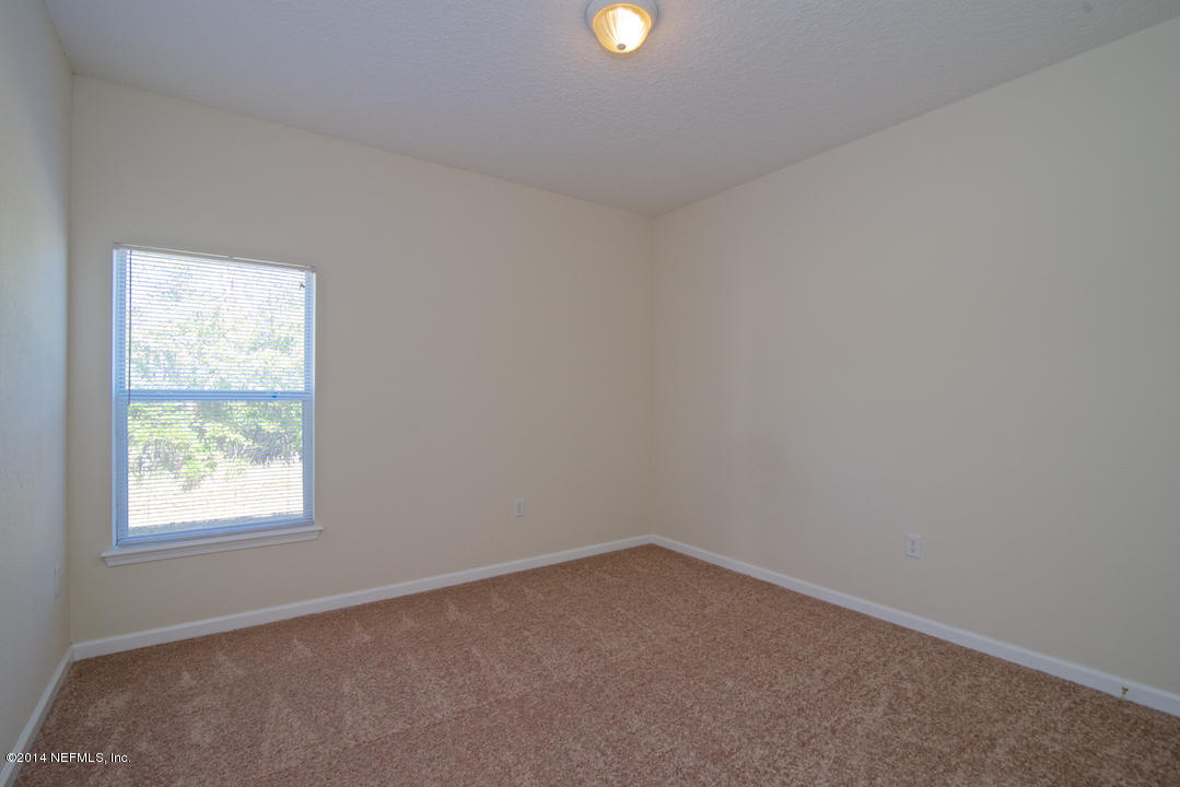7170 Rampart Ridge Circle West Jacksonville, FL 32244 - Photo 12 of 22 an empty room with a window