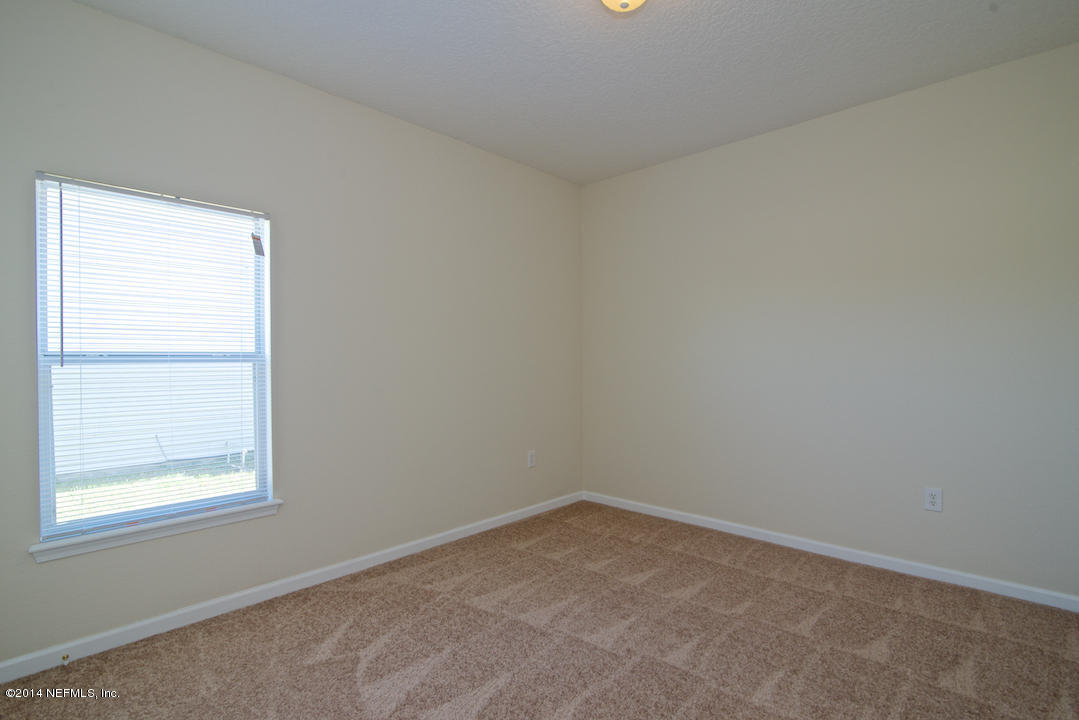 7170 Rampart Ridge Circle West Jacksonville, FL 32244 - Photo 14 of 22 an empty room with a window
