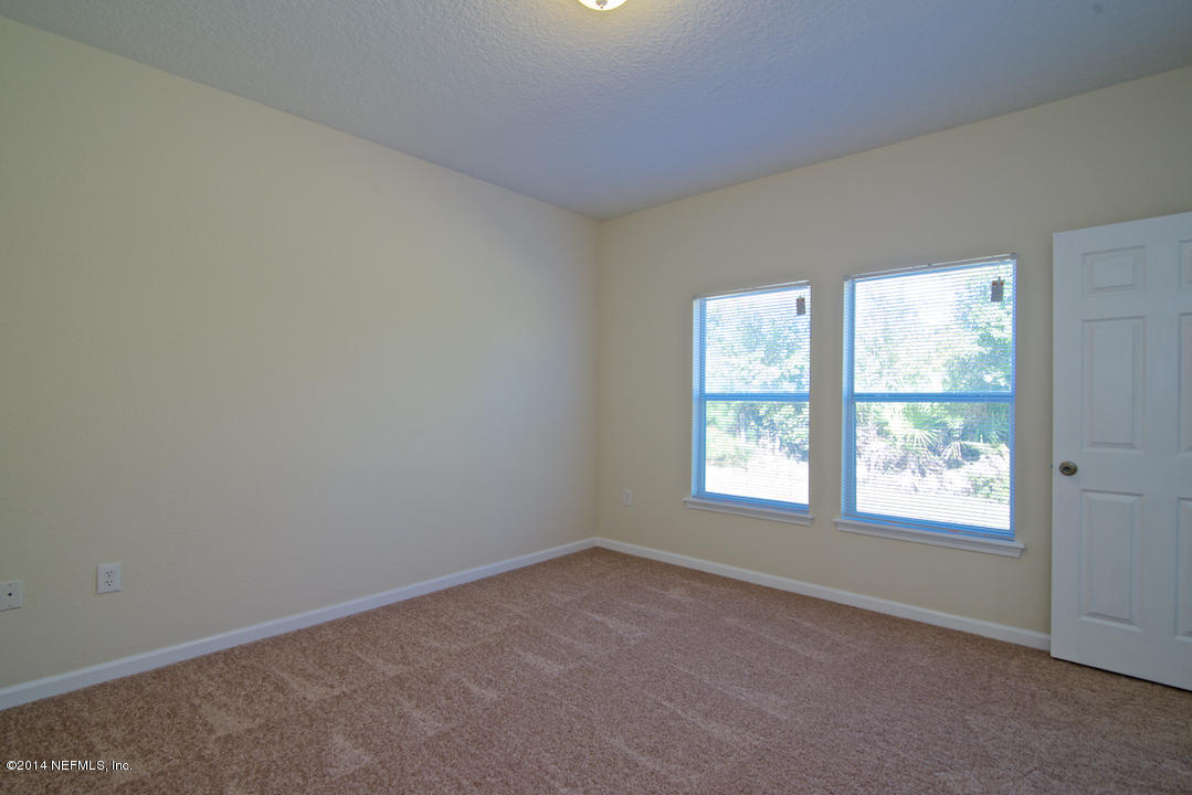 7170 Rampart Ridge Circle West Jacksonville, FL 32244 - Photo 15 of 22 an empty room with a window