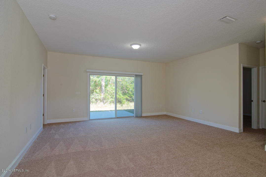 7170 Rampart Ridge Circle West Jacksonville, FL 32244 - Photo 4 of 22 a view of an empty room with a window