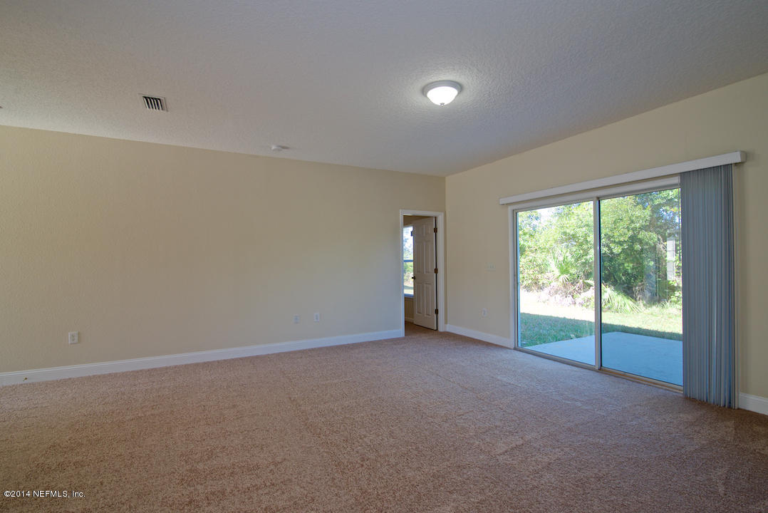 7170 Rampart Ridge Circle West Jacksonville, FL 32244 - Photo 5 of 22 a view of an empty room with a window