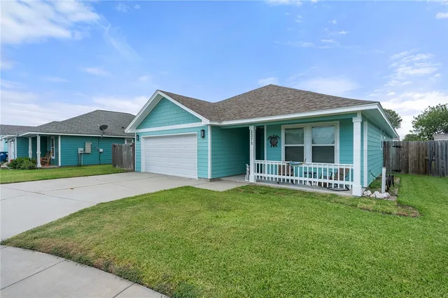 a house view with a garden space