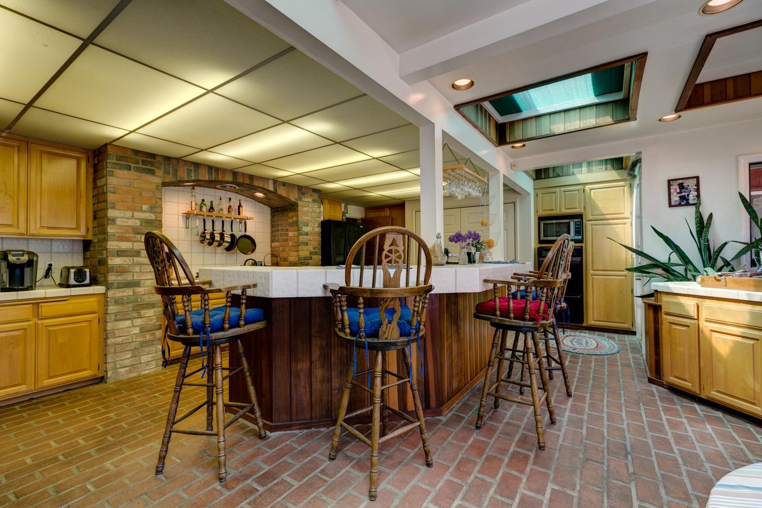 516 Palomar Road Ojai, CA 93023 - Photo 13 of 45 a view of a chairs and table in a room