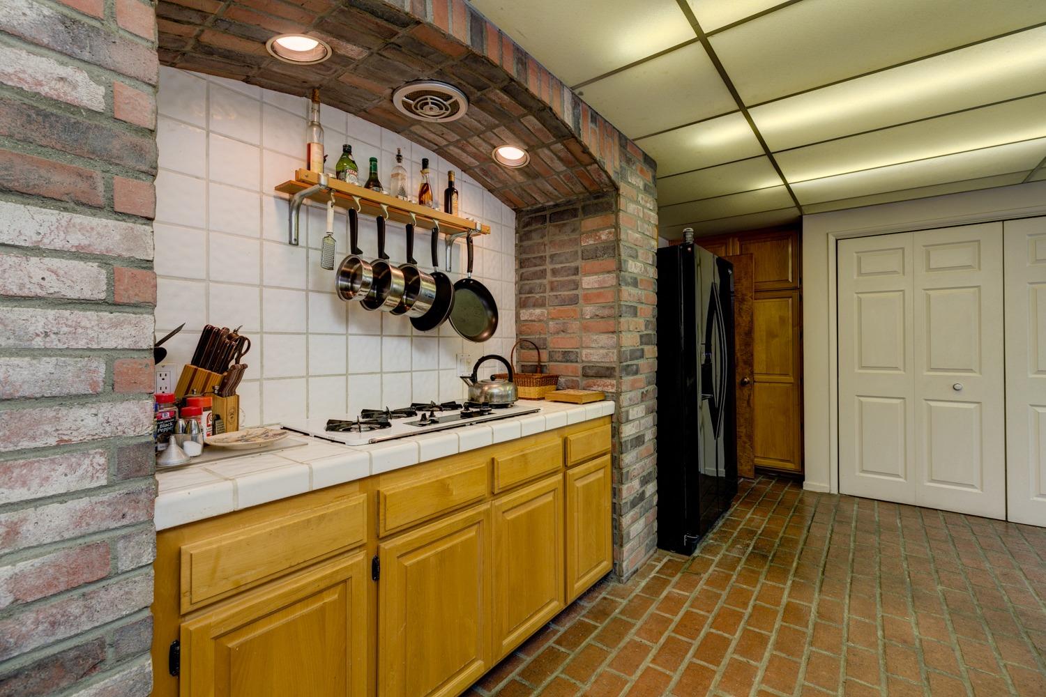 516 Palomar Road Ojai, CA 93023 - Photo 14 of 45 a kitchen with a sink and cabinets