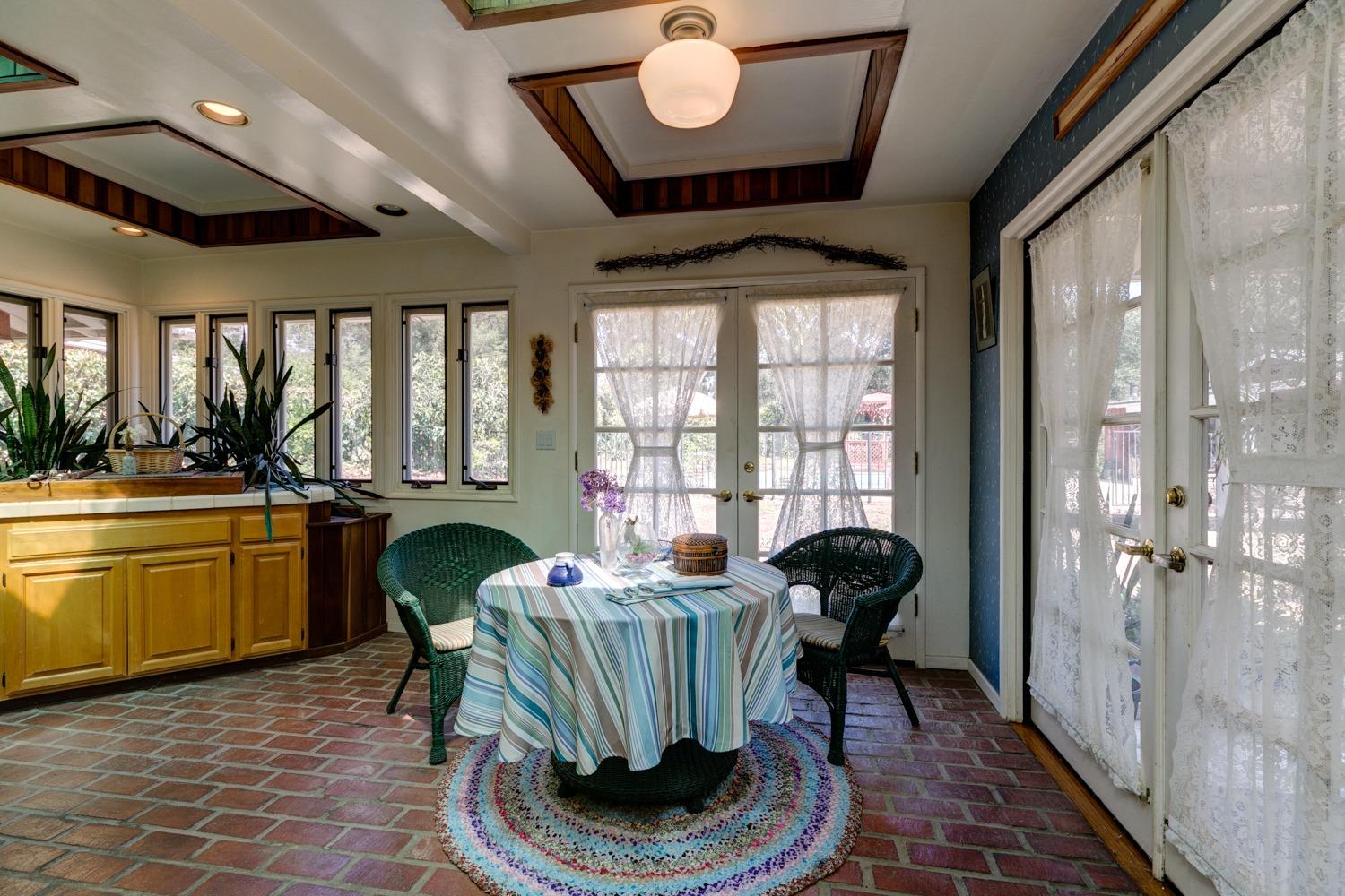 516 Palomar Road Ojai, CA 93023 - Photo 15 of 45 a living room with furniture and a large window