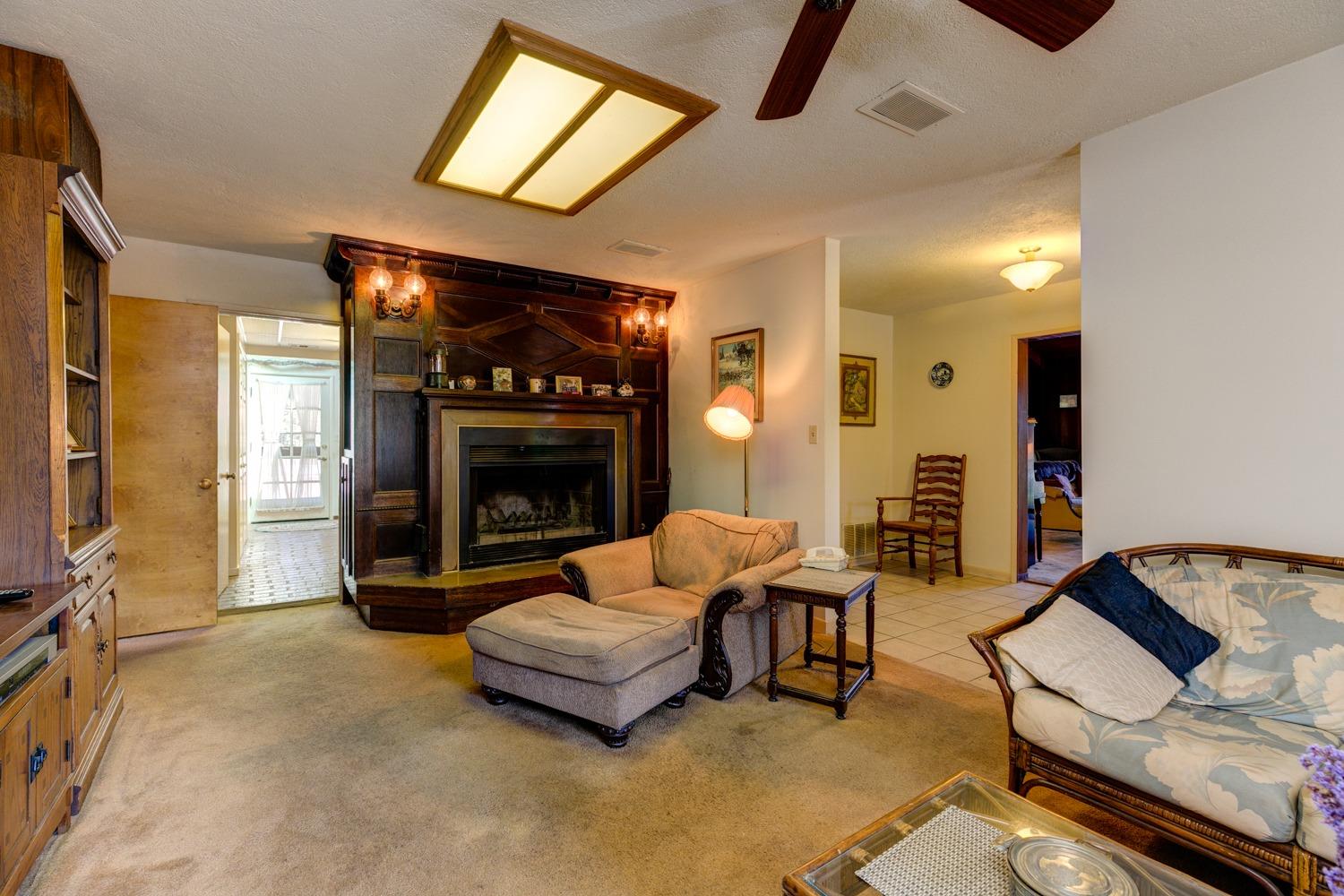 516 Palomar Road Ojai, CA 93023 - Photo 16 of 45 a living room with furniture and a fireplace