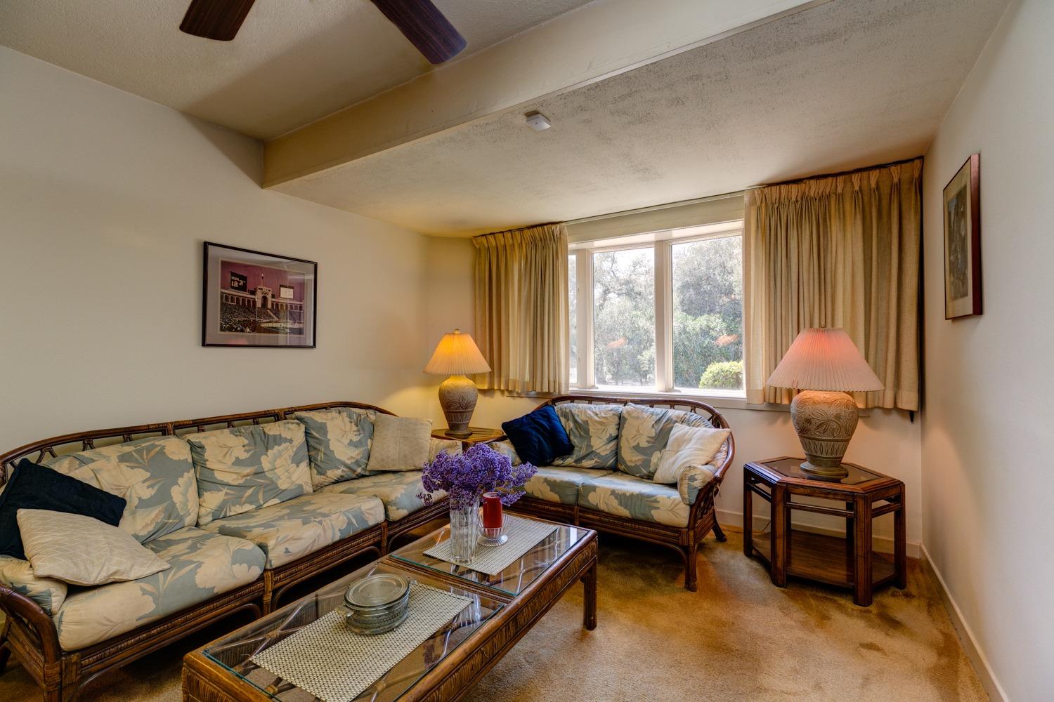 516 Palomar Road Ojai, CA 93023 - Photo 17 of 45 a living room with furniture and a large window