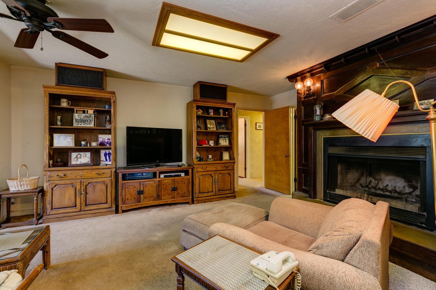 516 Palomar Road Ojai, CA 93023 - Photo 18 of 45 a living room with furniture and a flat screen tv