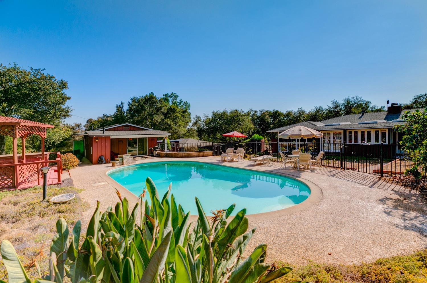 516 Palomar Road Ojai, CA 93023 - Photo 2 of 45 an outdoor space with pool and furniture