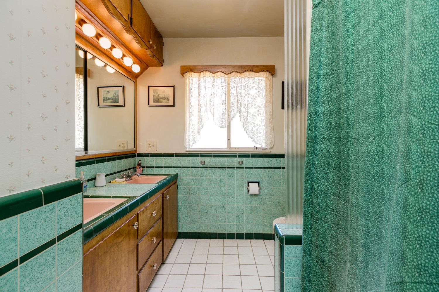 516 Palomar Road Ojai, CA 93023 - Photo 21 of 45 a bathroom with a sink and a mirror