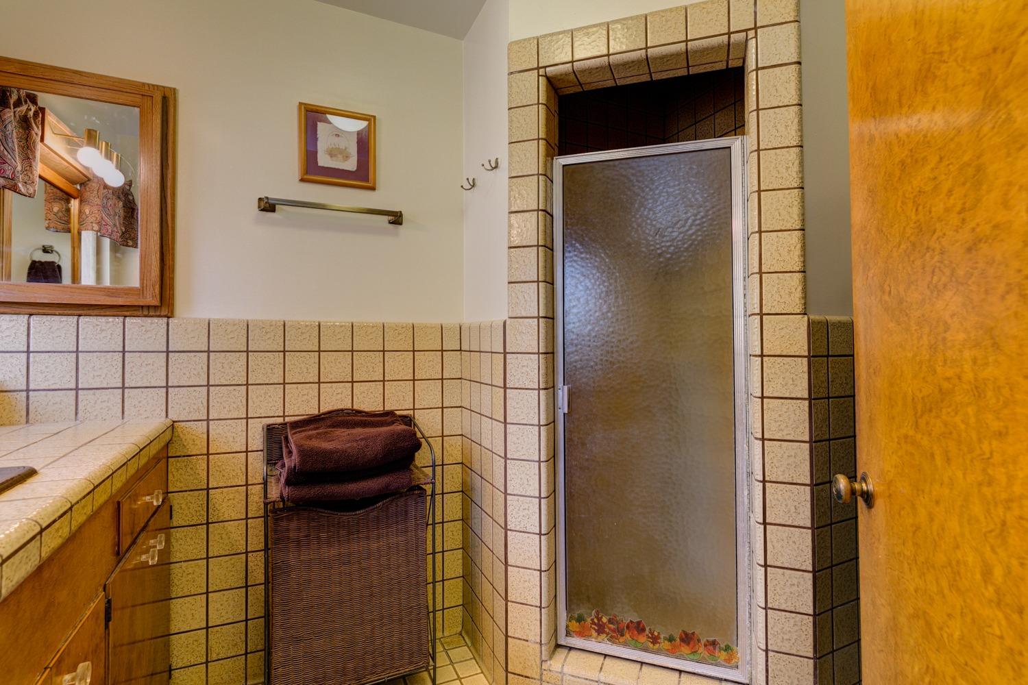 516 Palomar Road Ojai, CA 93023 - Photo 23 of 45 a bathroom with a shower and a sink