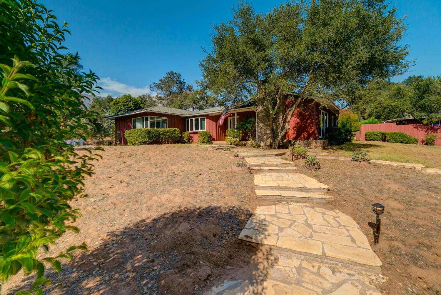 516 Palomar Road Ojai, CA 93023 - Photo 26 of 45 a front view of a house with a yard