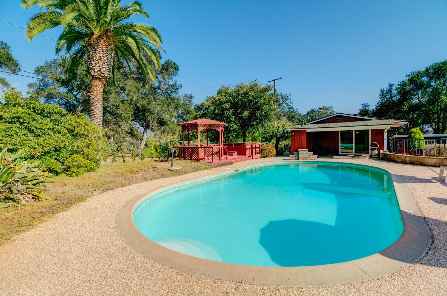 516 Palomar Road Ojai, CA 93023 - Photo 27 of 45 a view of a house with a swimming pool