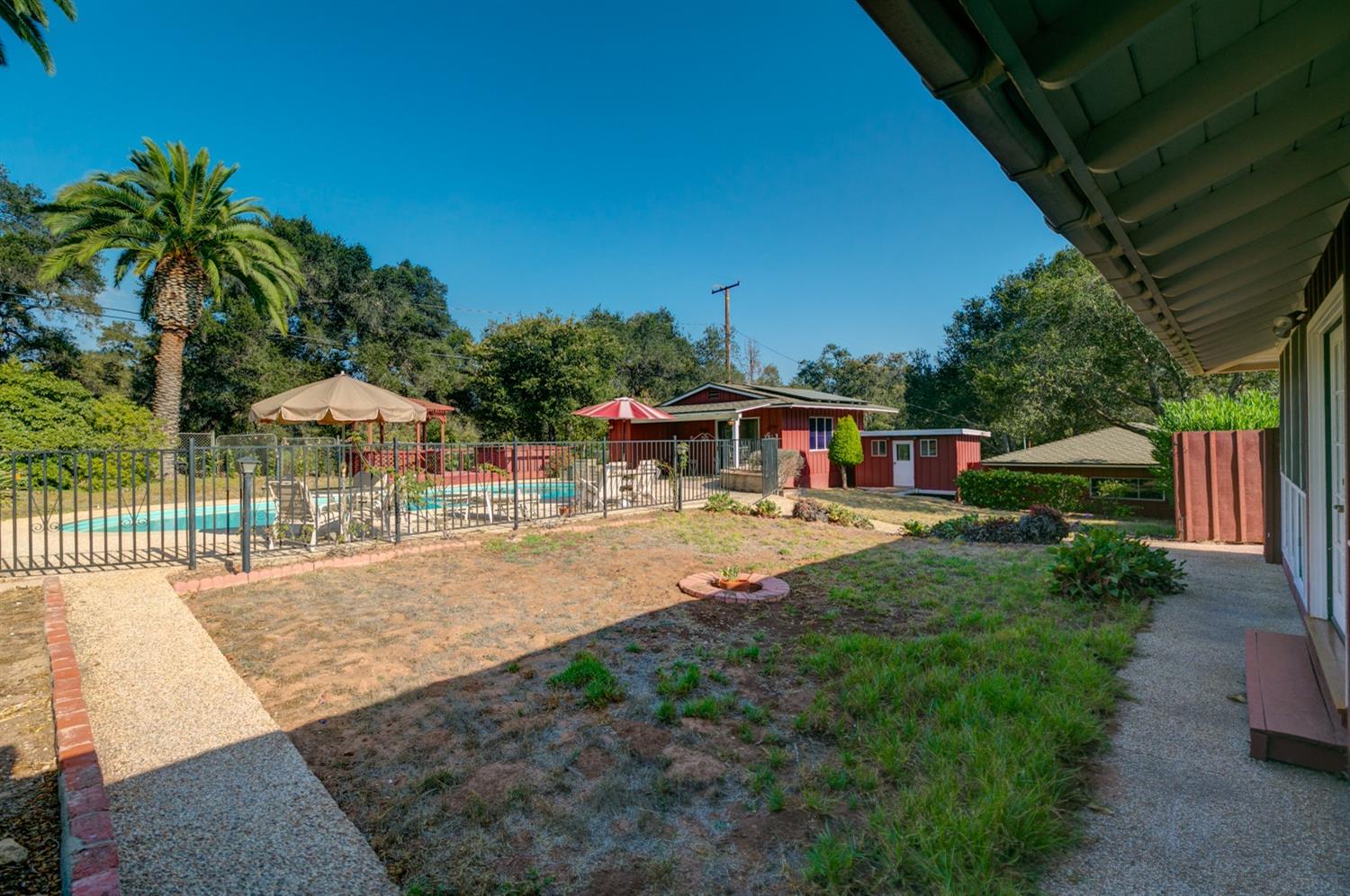 516 Palomar Road Ojai, CA 93023 - Photo 35 of 45 a view of a house with backyard and sitting area
