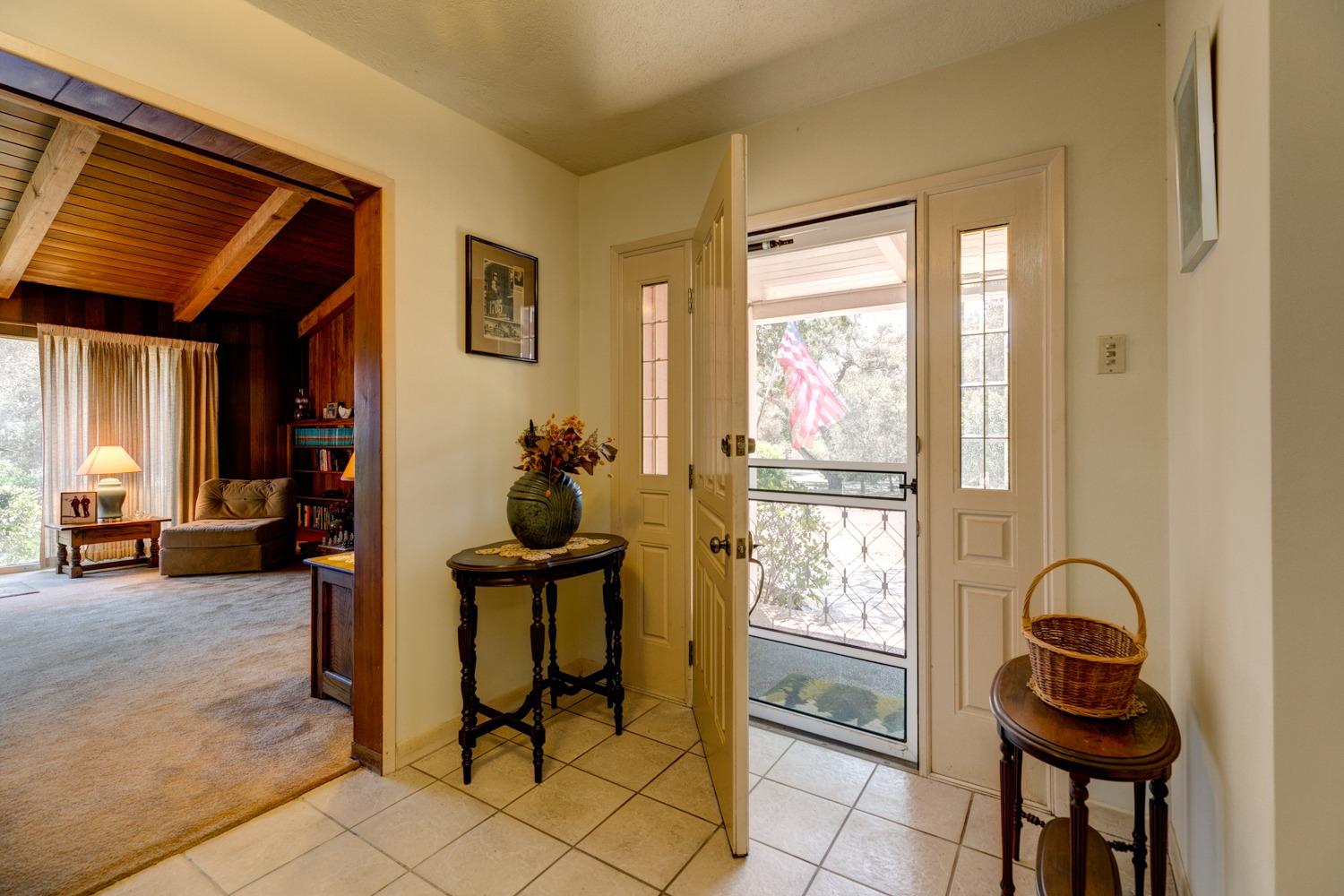 516 Palomar Road Ojai, CA 93023 - Photo 6 of 45 a view of a entryway with furniture and windows
