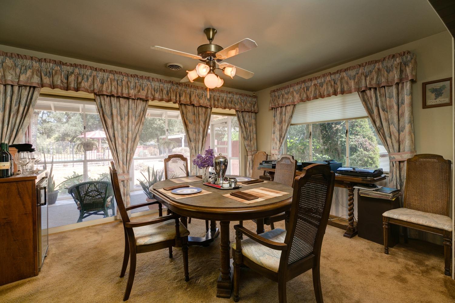 516 Palomar Road Ojai, CA 93023 - Photo 10 of 45 a view of a dining room with furniture window and outside view