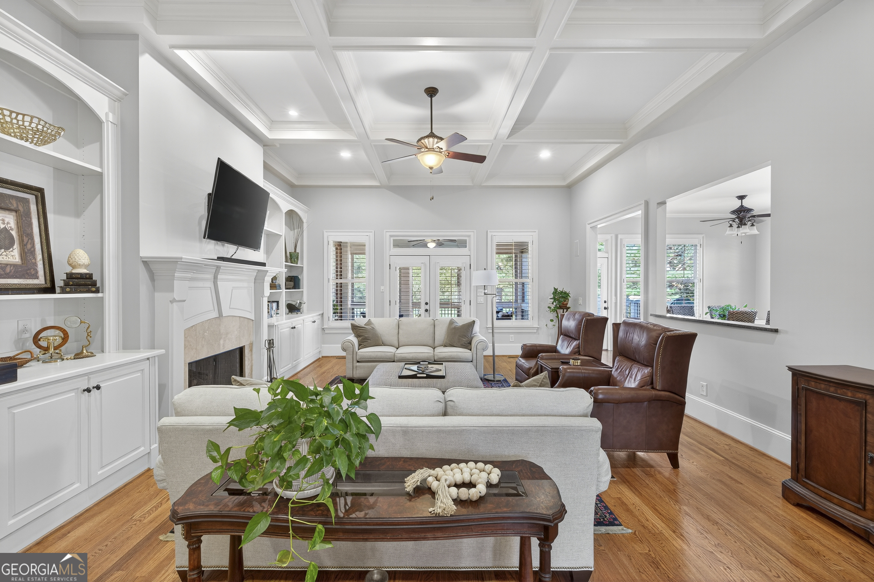 675 Garden Circle Statham, GA 30666 - Photo 19 of 98 a living room with fireplace furniture and a flat screen tv
