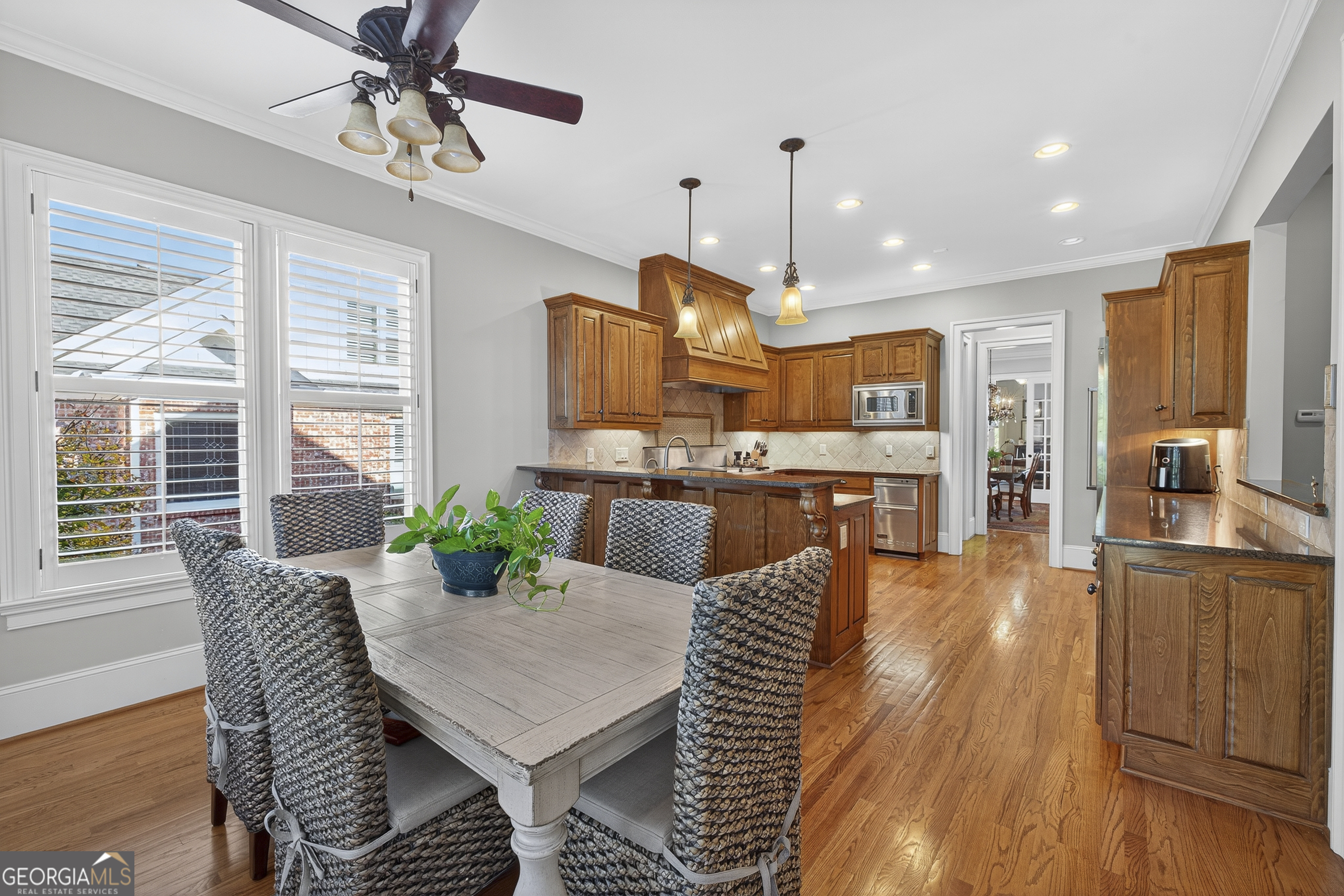 675 Garden Circle Statham, GA 30666 - Photo 24 of 98 a view of a dining room with furniture window and wooden floor