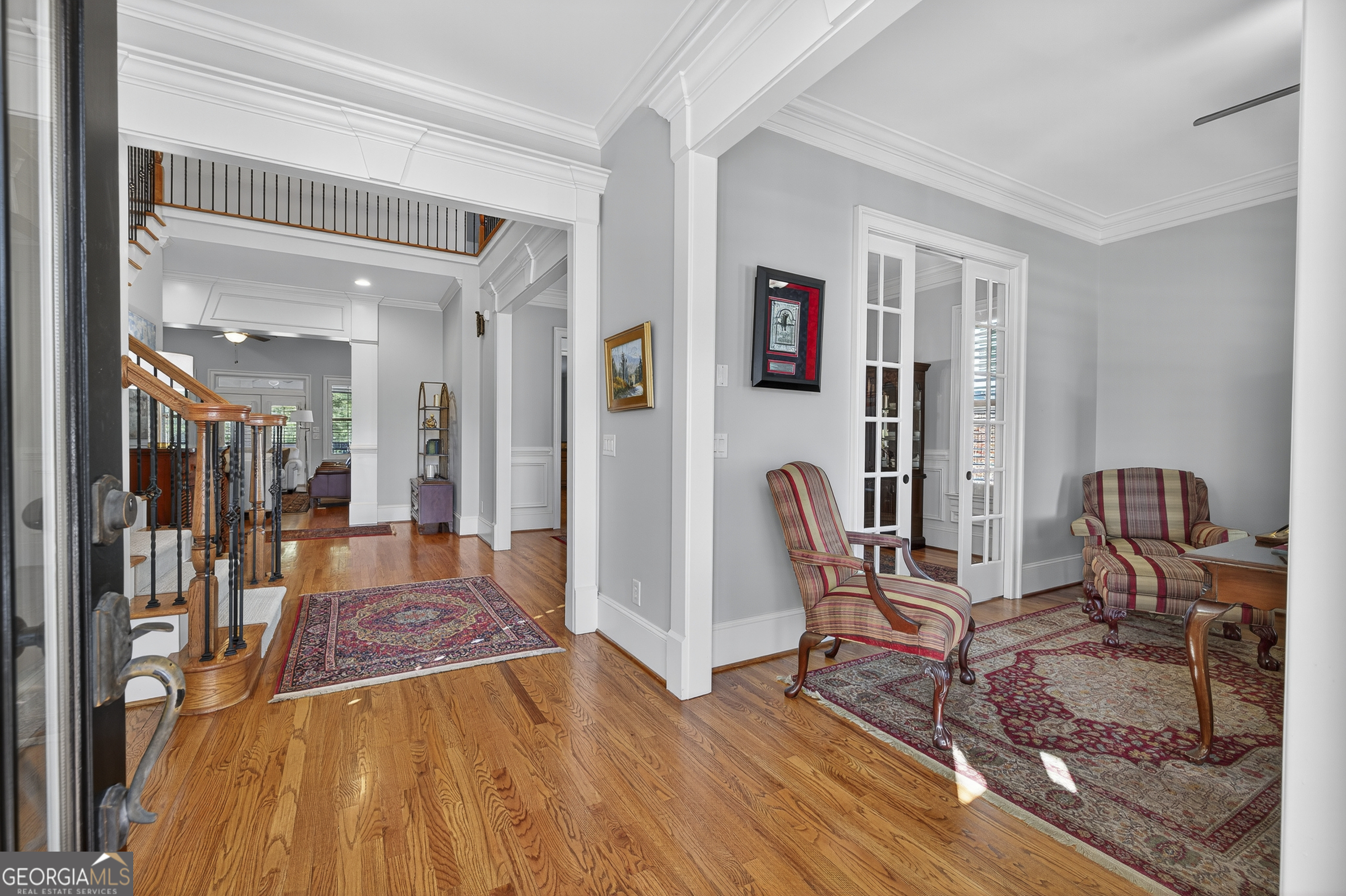 675 Garden Circle Statham, GA 30666 - Photo 36 of 98 a view of a livingroom with furniture wooden floor and a rug